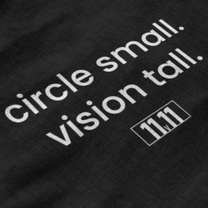 closed-up print reading "Circle small vision tall"